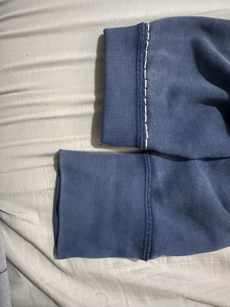 Shortened cuffs on a sweater