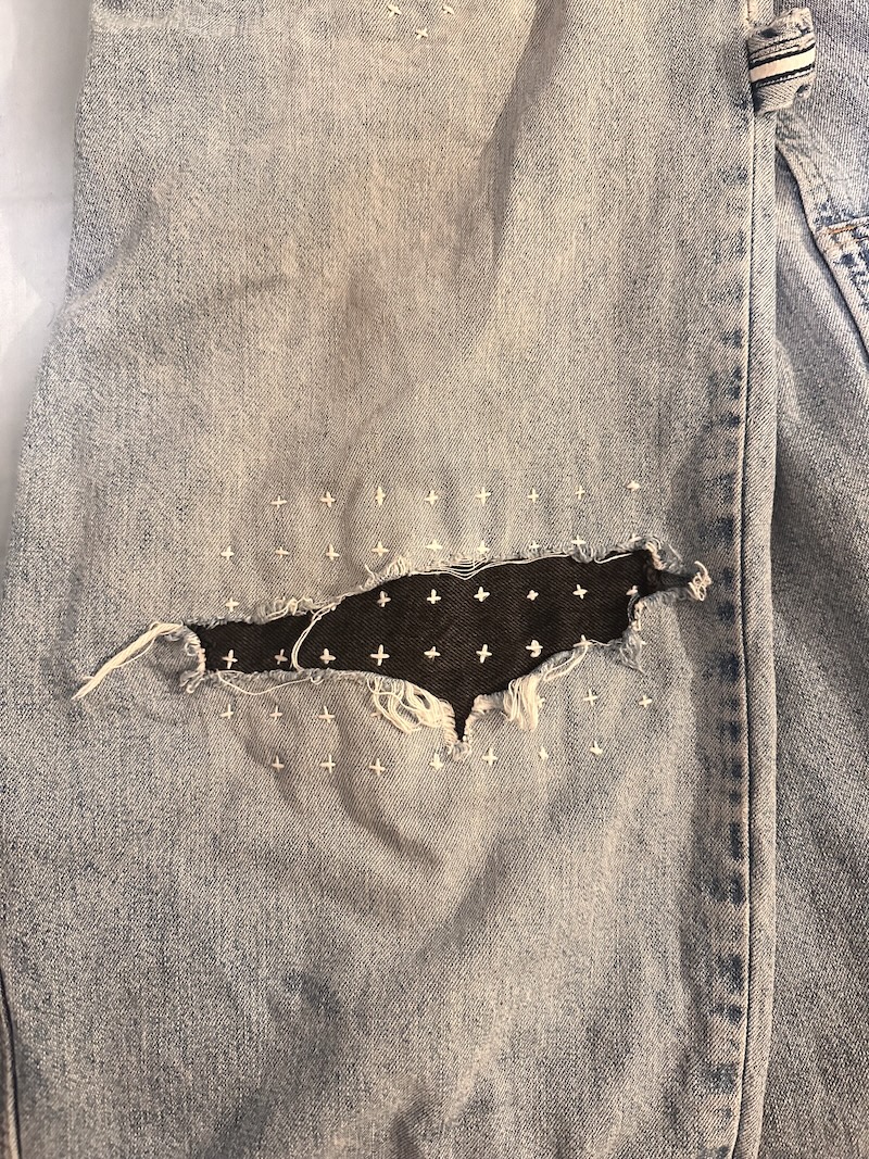 Black backing fabric behind the hole